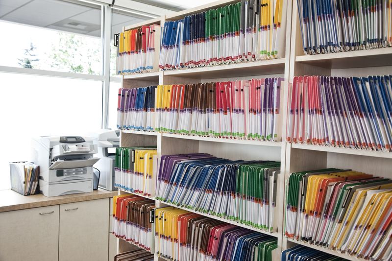 Dossiers classés d'une étude à numériser à Sion