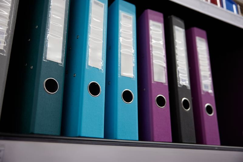 Classeurs d'archives à numériser à Aigle